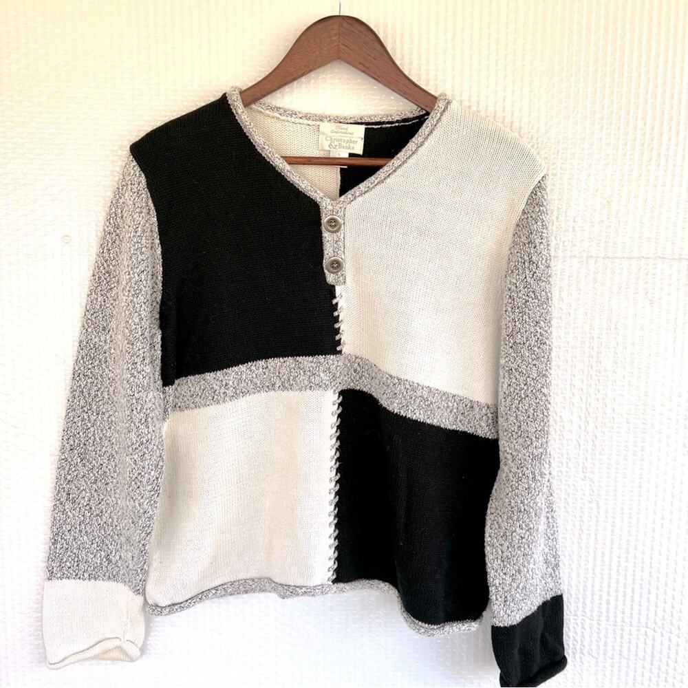 Cristopher Banks black gray and white sweater. Slip on with silver buttons sz L